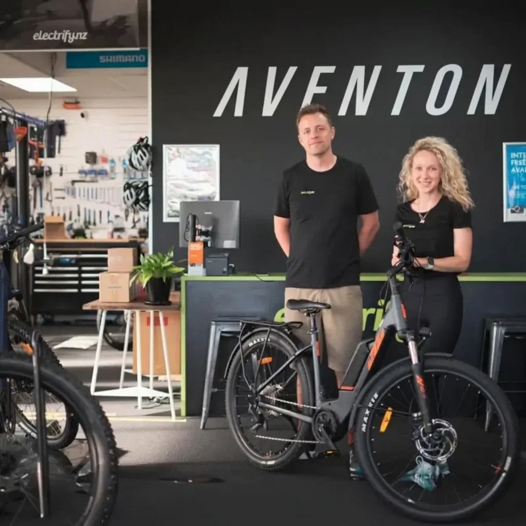 Electrify NZ North Shore owners in store with an Aventon e-bike